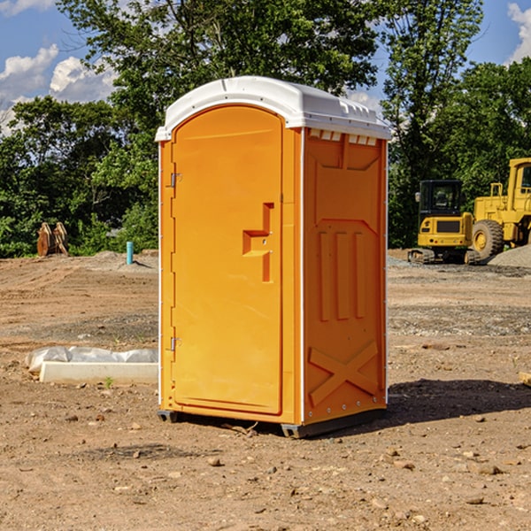 how often are the portable restrooms cleaned and serviced during a rental period in Harvard IL